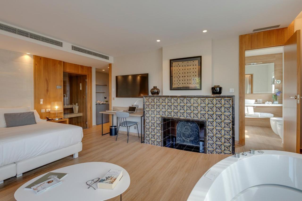 Hotel Boutique Mirlo Barcellona Esterno foto A suite at the hotel